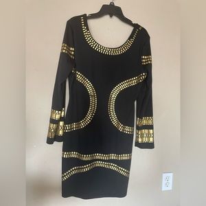 Beautiful black dress with gold trimmings